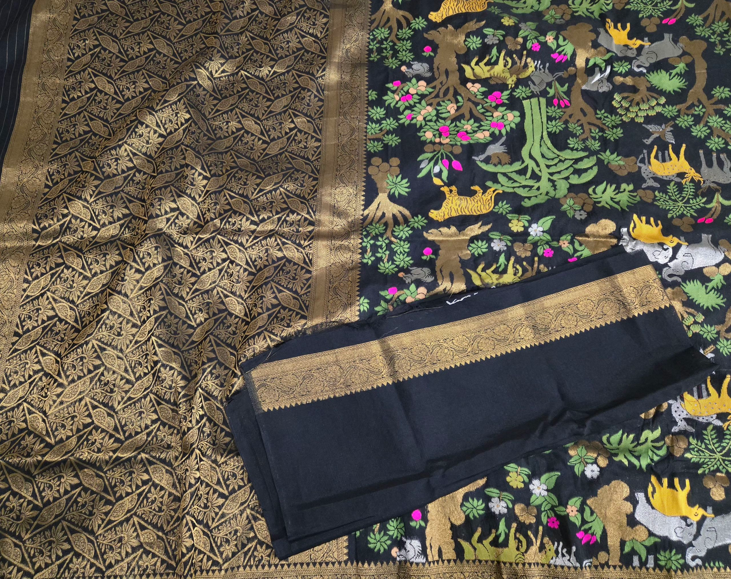 Beautiful and premium black saree with rich antique pallu and small borders