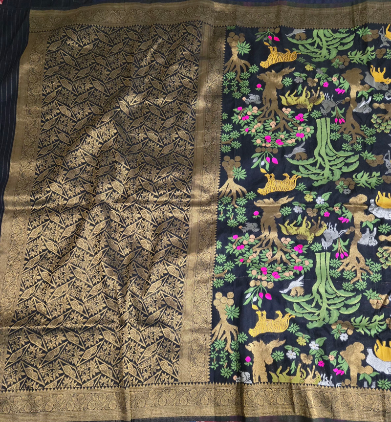 Beautiful and premium black saree with rich antique pallu and small borders